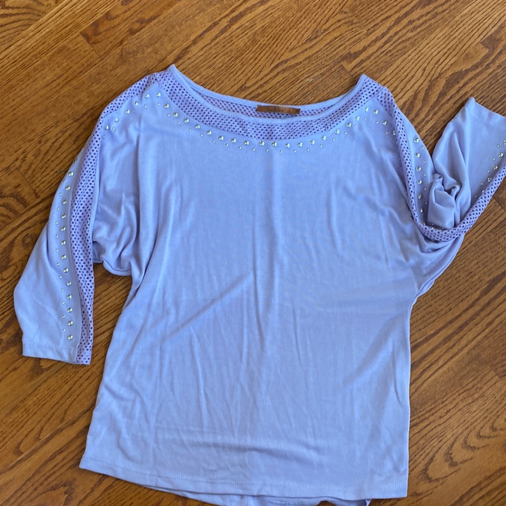 Lite purple sweater with studs and dressy see thru holes